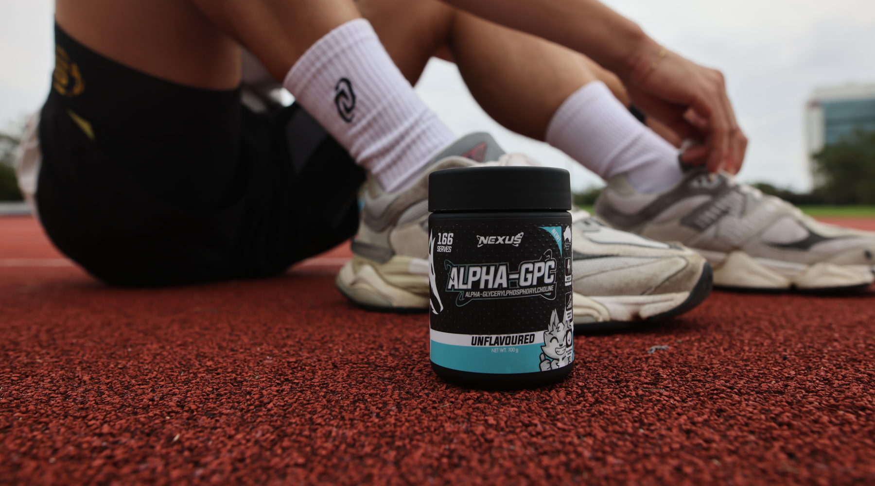 tub of alpha gpc at feet of runner